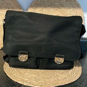 The Sak Two pockets front facing with zipper 6 different zipper compartments